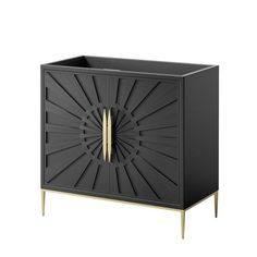 a black cabinet with gold handles and an intricate design on the front, it has a wooden