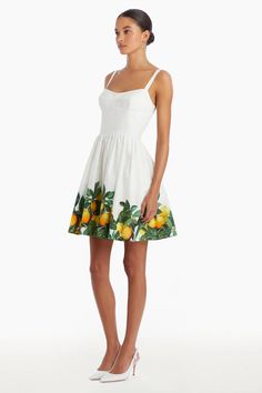 When life gives you lemons, put on the Napoli dress and sip on some lemonade. This lemon printed cotton poplin dress is the perfect addition to your al fresco afternoon. The sculpted bodice and smocking back detail will have your waist cinched to perfection and moving with ease all summer long. By Amanda Uprichard. Pair it with your favorite Carrie Dunham bag! Mini Dress Scoop Neck Lemon Print Detailing Invisible Zipper Lined Self: 100% Cotton / Lining: 100% Cotton Machine Wash Cold, Line Dry Cotton Poplin Dress, Cami Nyc, Mini Dress Formal, Amanda Uprichard, Lemon Dress, Lemon Print, Poplin Dress, Maxi Gowns, Trina Turk