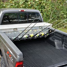 a truck with fishing rods in the back