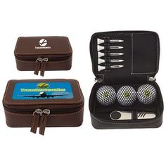 three golf balls in a brown case