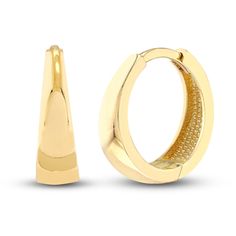 Dynamic tapered tubes are polished to a high shine in these timeless women's hoop earrings. Fashioned in 14K yellow gold, the earrings secure in place with snap-lock backs. Modern Small Hoop Huggie Earrings For Formal Events, Minimalist Huggie Hoop Earrings For Formal Occasions, Formal Hypoallergenic Huggie Hoop Earrings, Modern Hypoallergenic Huggie Earrings For Formal Occasions, Modern Hypoallergenic Huggie Earrings For Formal Events, Gold Hinged Huggie Earrings For Formal Occasions, Formal Hinged Hoop Huggie Earrings, Modern Hinged Huggie Hoop Earrings, Modern 14k Gold Huggie Earrings For Formal Occasions