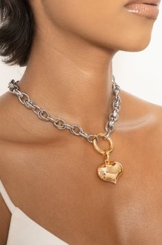 Materials 18k Gold Plated and Rhodium Plated, Steel, Brass Length 15" with a 5" chain extender Closure Lobster Clasp Silver Heart-shaped Gold-plated Jewelry, Silver Heart-shaped Gold Plated Jewelry, Heart-shaped Gold-plated Silver Jewelry, Gold Plated Silver Heart Jewelry, Silver Gold Plated Heart Jewelry, Heart Pendant Metal Jewelry Tarnish Resistant, Silver Double Heart Necklace Tarnish Resistant, Tarnish-resistant Silver-tone Heart Necklace, Gold Plated Silver Heart Necklace Tarnish Resistant