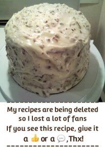 a cake with frosting sitting on top of a white plate