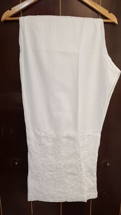 Cotton Embroidered Pallazos in white. Soft, Comfortable, Breathable and Elegant is how we can describe these pallazos. They are the most practical Lounge /Yoga Pants Thick Smocked Waist Band for extended Comfort. Length of the pant - 39 inches Bottom hem width - 14 inches wide. sizes available are : S - for fit upto 32 waist. M - for fit upto size 34 waist L - for fit upto size 36 waist XL - for fit upto size 38 waist Full-length Cotton Yoga Pants For Summer, Casual White Moisture-wicking Yoga Pants, White Casual Moisture-wicking Yoga Pants, Cotton Ankle-length Harem Pants For Yoga, Non-stretch Cotton Harem Yoga Pants, Black Camisole, Beautiful Embroidery, Sleeveless Blouse, Yoga Pants