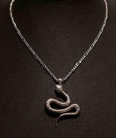 Beautifully made sterling silver snake pendant with silver necklace for all snake lovers. Handmade by Hungarian goldsmiths with love. The silver necklace is available in different sizes and in oxidized version aswell. You can buy only the pendant aswell. The viper is wonderfully detailed such as its head, mouth, scales and supper realistic.  The body coils are well executed. Shines due to well made polish. Material: Sterling silver (925 silver) Pendant weight: 4,2 g This is a must piece for all Lover Necklace, Snake Lovers, Lovers Necklace, Snake Pendant, Snake Jewelry, Silver 925 Necklace, Pendant Silver, Necklace Handmade, Handmade Sterling Silver