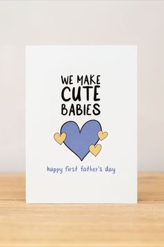 we make cute babies happy father's day card with blue heart on the front