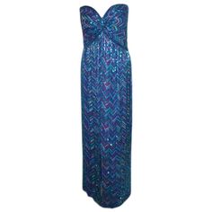 This is a long, multi colored, silk beaded gown by Bob Mackie, from 1980. The gown is strapless with beading all over, a constructed bustier, and a zipper up the back. 
 
 This beaded gown by Bob Mackie is available to be viewed privately in our Beverly Hills boutique couture salon during business hours. Please telephone us with any questions or if you wish to set up a private appointment to view it personally.
 
 Please feel free to contact us anytime should you be looking for a special vintage Strapless Multicolor Evening Maxi Dress, Multicolor Strapless Maxi Dress For Evening, Multicolor Floor-length Cocktail Evening Dress, Multicolor Maxi Dress For Party, Colorful Gowns, Vintage Bob Mackie, Beaded Fringe Dress, Gown Green, Net Gowns