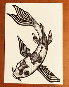 a black and white drawing of a koi fish