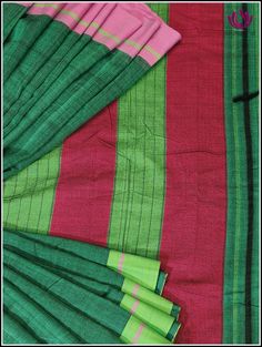 Patteda Anchu sarees are handwoven Handloom sarees from in and around the Villages of Gajendragarh,Karnataka. The saree is name after it’s border and checks pattern is also know as Dundina seraa, devaru seraa,laxmi seraa or pooja seraa. This Patteda Anchu saree is certified with a Handloom Mark and is perfect for the summer weather. It is lightweight for comfort and features a Green body with a Ganga Jamuna border in pink and Green . The modern yet elegant design makes any outing special and inc Green Handloom Cotton Silk Saree, Green Cotton Silk Handloom Saree, Traditional Green Handloom Saree, Green Cotton Saree With Traditional Patterns, Multicolor Cotton Silk Traditional Wear With Border, Green Saree With Weaving Work For Festivals, Green Cotton Handloom Saree, Green Cotton Saree With Zari Weaving, Green Cotton Traditional Wear With Zari Weaving