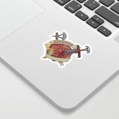 a sticker with an image of a hammer and shield on the side of a laptop