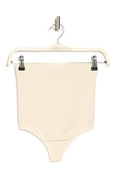 Soft and comfortable for everyday wear, this cotton-blend thong is made with a seamless design that's invisible under clothing. 14" rise (size S/M) Lined gusset Shell: 93% nylon, 7% spandex; Waistband: 83% nylon, 17% spandex; Crotch: 75% nylon, 19% cotton, 6% spandex Hand wash cold, dry flat Imported Nordstrom Store, Hand Washing, Everyday Wear, Cotton Blend, Nordstrom, High Waisted, How To Wear