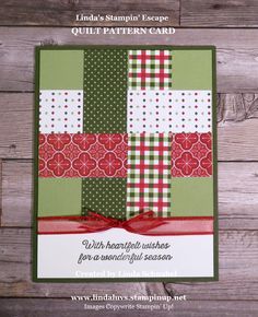 the quilted christmas card is displayed on a wooden surface with text that reads,