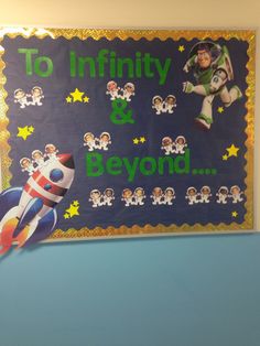 a bulletin board that says to infinity and beyond with cartoon characters on it