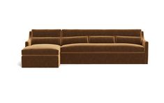 a brown sectional couch sitting on top of a white floor