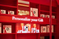 a red shelf with personalize your gift boxes on it and the words, personalize your gift