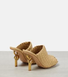 Formal Woven Leather Mules, Luxury Gold Mules For Spring, Gold Leather High Heel Mules, Gold High Heel Leather Mules, Chic Woven Leather Mules With Open Heel, Luxury Open Toe Heels With Woven Leather, Chic Formal Sandals With Woven Leather, Luxury Evening Sandals With Intrecciato Weave, Luxury Woven Leather Mules