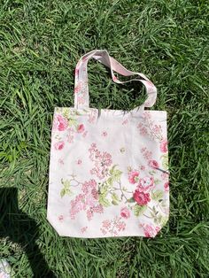 "Teflon waterproof handbags‼ ️ Pink roses flowers print. With inner pocket. Without zipper. Washable. Made of waterproof Turkish teflon fabric. Size: 37 x 38 cm - 15 x 15 inches Ready to ship One of a kind This is a fabric with Teflon impregnation. This gives it a number of advantages, among which the most important are: ❤️ Water repellent! A drop of liquid simply rolls over the surface of the tablecloth, protecting the table They are resistant to various temperatures. Range - from -70 to +250 d Pink Floral Print Bags For Summer, Summer Pink Floral Print Bags, Rectangular Rose Everyday Bag, Spring Pink Canvas Gift Bag, Pink Double Handle Canvas Bag For Spring, Spring Pink Double Handle Canvas Bag, Pink Floral Print Shopping Bag, Pink Floral Print Cotton Bag, Eco-friendly Pink Bag With Double Handle