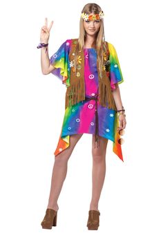 a woman in a hippie costume is standing with her hands up to the side