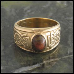 Celtic Galoglach Ring with Gemstones in Gold | Walker Metalsmiths Garnet Rings For Men, Red Garnet Ring Men, Irish Ring Men, Mens Gemstone Rings Viking, Mens Celtic Rings, Heart Knot Ring, Custom Gold Rings, Gold Celtic Rings, Celtic Silver Rings For Men