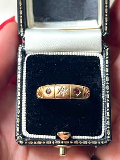 Lovely Antique Victorian 18k Gold Ruby & star set Diamond Ring. It has beautiful engraving details on both sides. The ring is made in Birmingham and is fully hallmarked.  Weight: 2.7 grams Ring size: US 7.5 (resizable upon request) Good antique conditions. Thank you for visiting Boudoir Vintage!   Please feel free to contact me for further information or photos.  I offer international shipping. Your item will be packed with extreme care and will be shipped within 3-5 working days. If you are dissatisfied with your item, please feel free to contact me and would be happy to assist.  If you are interested in paying in installments or reserve an item, please send me an inquiry. To continue visiting my shop, please visit  https://www.etsy.com/shop/BoudoirVintageBijoux/ FOLLOW ME on Instagram: h Heirloom Yellow Gold Star-shaped Ring, Heirloom Yellow Gold Star Ring, Vintage Star-shaped Anniversary Rings, Victorian Engagement Ring, Antique Rings Victorian, Victorian Engagement Rings, Victorian Ring, Victorian Rings, Star Ruby