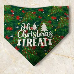 a green bandana with the words oh christmas treat on it