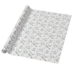 a white wrapping paper with cartoon animals on it