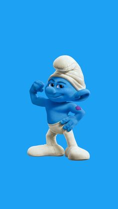 the smurfs character is posed on a blue background