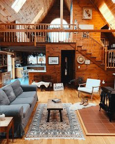 an instagram photo of a living room with wood paneling