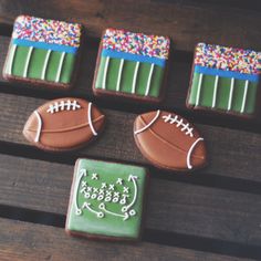 decorated cookies with footballs and sprinkles on a picnic table