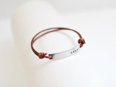 Brave bracelet be brave bracelet bracelets for women | Etsy Everyday Adjustable Leather Bracelet Hand Stamped, Adjustable Everyday Leather Bracelet, Adjustable Rectangular Name Bracelet For Everyday, Personalized Brown Leather Bracelet For Everyday, Everyday Rectangular Bracelet With Engraving Option, Rectangular Bracelet With Engraving Option For Everyday, Brown Hand Stamped Bracelets For Everyday, Silver Leather Bracelet With Hand Stamped Details For Everyday, Everyday Name Bracelet With Engraving Option For Father's Day