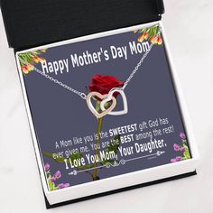 a mother's day card with a rose in the shape of a heart on it