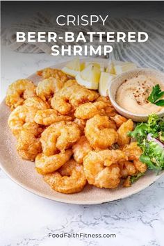 crispy beer battered shrimp on a plate with dipping sauce