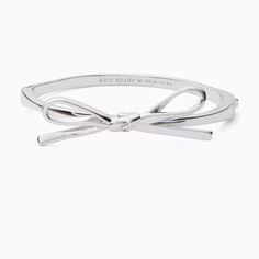 $79 Kate Spade Skinny Mini Bow Bangle In Silver Chic Silver Bracelets For Wedding, Adjustable Metal Bracelet By Kate Spade, Trendy Kate Spade Jewelry For Party, Trendy Kate Spade Party Jewelry, Elegant Adjustable Bracelets For Spring, Chic Spring Bangle Bracelets, Chic Adjustable Bracelets, Chic Spring Metal Jewelry, Silver Bracelets For Spring Formal Occasions