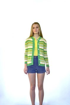 70s Retro Sweater + Yellow | Bright Green | White Colored Stripes of Varying Thickness + Contrasting Green Collar and Button Placket + Long Sleeve + Lightweight Fabric + Buttons up Front + Collarless + Crew Neck + Straight Hem + Excellent Vintage Condition + Will Best Fit Sizes xxs–s Specifics |||(Some stretch)Bust - 18.5”Waist - 16.25”Shoulders - 15.25”Sleeves - 22.25”Hips - 17” (width at hem)Length - 24.25”Size - Marked Size | Estimated Size xxs–sColor - Green | Yellow | White Label - GeistexF Retro Long Sleeve Cardigan, Vintage Green Cardigan For Spring, Vintage Green Spring Cardigan, Retro Fitted Button-up Cardigan, Fitted Button-up Retro Cardigan, Retro Cotton Cardigan With Button Closure, Summer Retro Long Sleeve Cardigan, Vintage Green Cardigan With Button Closure, Vintage Fitted Summer Cardigan