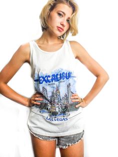 Vintage Excalibur 90s Tee Great Colors ! Super Hip and Stylish.  M Pit to Pit 18in Top to Bottom 23in Graffiti Print Tops For Summer, Graffiti Print Tops For Summer Alternative Fashion, Graffiti Print Tops For Alternative Summer Fashion, 90s Graphic Print Festival Tops, Y2k Graphic Print Tops For Festival, Y2k Style Graphic Print Tops For Festivals, 90s Crew Neck Festival Tops, 90s Style Crew Neck Festival Tops, 90s Style Festival Tops With Crew Neck