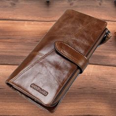 Product information: Product Name：Wallet Material: genuine leather Lining texture: polyester Opening method: zipper buckle Small bag internal structure: concealed compartment, large bill holder, photo position, zipper compartment, ID position, card position Style: casual Color: brown, brown, long black, long brown, long brown Size: 19X9X3CM(L*W*H) Weight: 190g Packing list: Wallet x1 Brown Bifold Wallet With Zipper Pocket, Brown Travel Wallet With Zipper Closure, Classic Brown Wallet With Zipper Pocket, Brown Rectangular Wallet With Zipper Closure, Brown Business Wallet With Coin Pocket, Brown Wallet With Coin Pocket For Business, Bill Holder, Men Wallet, European Women