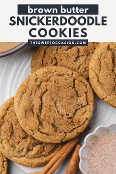 brown butter snickkerdoodle cookies on a white plate next to cinnamon sticks