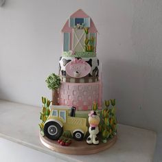 a cake made to look like a farm scene