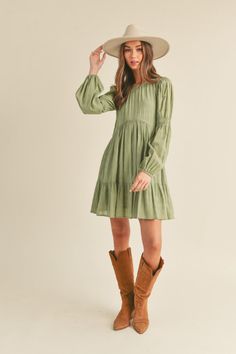 + Long sleeves with smocked elastic detail and covered elastic cuffs+ Round neck baby doll dress+ On-seam hip pockets+ Model is 5' 7" 34-24-35 and wears a S Baby Doll Dress, Tiered Dress, Babydoll Dress, British Indian, Plus Size Tops, Baby Doll, Doll Dress, Baby Dolls, Jumpsuit Romper