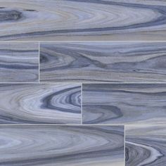 an image of marble tile that looks like it has been painted in blue and grey