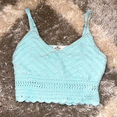 Nwt- Hollister Cropped Knitted Tank, Bright Teal, Size S Perfect For Casual/Fancy Occasions Light Blue Fitted Knitted Tops, Light Blue Pointelle Knit Top, Light Blue Knitted Top For Spring, Spring Light Blue Knitted Tops, Light Blue Fitted Knit Top, Fitted Light Blue Knit Top, Blue Textured Knit Top For Summer, Blue Knitted Crochet Top, Fitted Soft Knit Blue Top