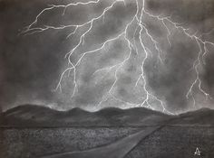 a black and white photo of a lightning storm in the sky over a desert landscape