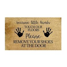 a door mat that says because little hands touch your floors please remove your shoes at the door