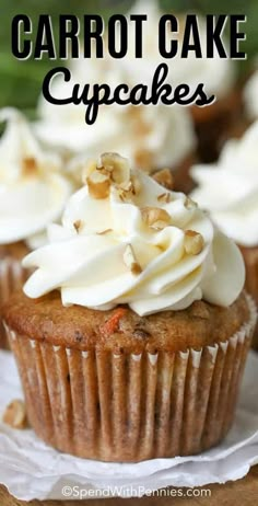 cupcakes with white frosting and walnuts on top