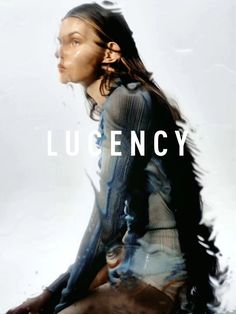 a woman sitting on the ground with her hair blowing in the wind and text that reads lucency