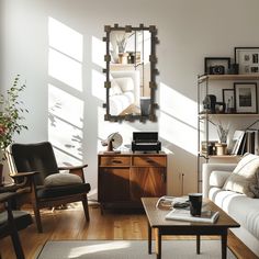 a living room filled with furniture and a mirror on the wall next to a coffee table