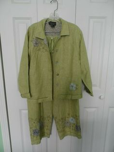 Woman's size Large Lime Green Linen Two Piece Pant Suit with Floral Embroidery Fine condition 2 piece jacket and pants pant suit in size large from Carol Anderson. Elastic waist as well as a drawstring. Floral design on the pants hem as well as the jacket. 100% linen. Shipping and handling is only $8.55. Pant Suit, Floral Embroidery, Lime Green, Military Jacket, 2 Piece, Women's Blazer, Elastic Waist, Floral Design, Two Piece