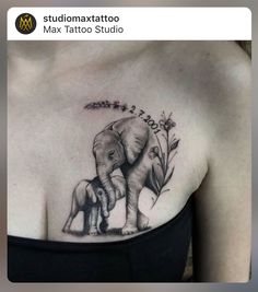 an elephant and her baby tattoo on the chest