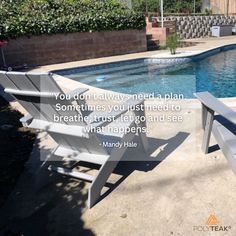 two wooden chairs sitting next to a swimming pool with a quote on it that reads you don't always need a plan sometimes, you just need to breathe