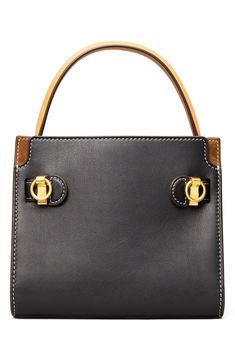 Inspired by and named for style icon Lee Radziwill, this straight-from-the-runway bag has a structured shape in always-classic black leather. Though small in size, this timelessly chic style features ample compartments and pockets to keep essentials organized. Style Name:Tory Burch Lee Radziwill Petite Leather Double Bag. Style Number: 6176626. Available in stores. Black Calf Leather Satchel With Branded Hardware, Black Calf Leather Satchel With Gold-tone Hardware, Designer Black Calf Leather Satchel, Designer Calf Leather Satchel For Evening, Black Calf Leather Satchel, Elegant Black Calf Leather Satchel, Timeless Evening Satchel With Branded Hardware, Designer Structured Satchel With Gold-tone Hardware, Evening Top Handle Satchel With Leather Lining